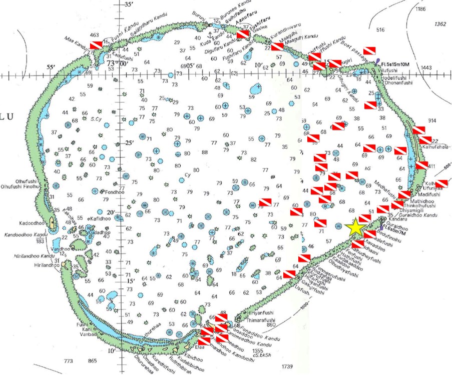 Map of Thaa Atoll showing islands, reef features, and marked dive locations